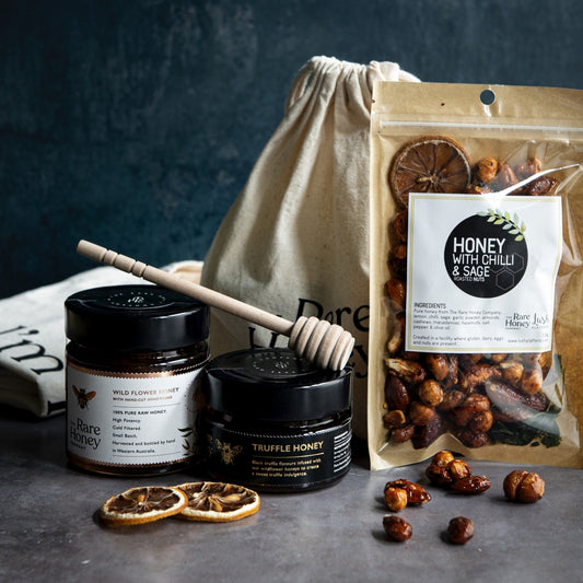 Limited edition festive pack with black truffle infused honey and hand cut honeycomb